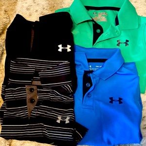 Lot of boys under armour polo shirts.